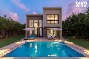 Sunlit Splendour by StayVista near Nagaon beach boasting an Outdoor pool and Modern chic interiors